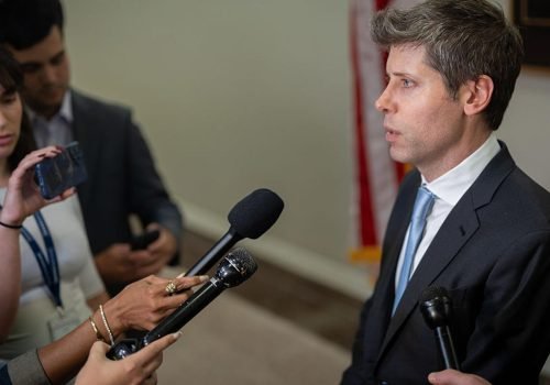 OpenAI CEO Sam Altman talks to reporters at the Dirksen Senate Office building in Washington, DC ...